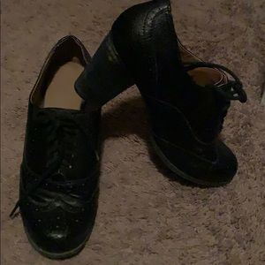 Lace up black booties with heel